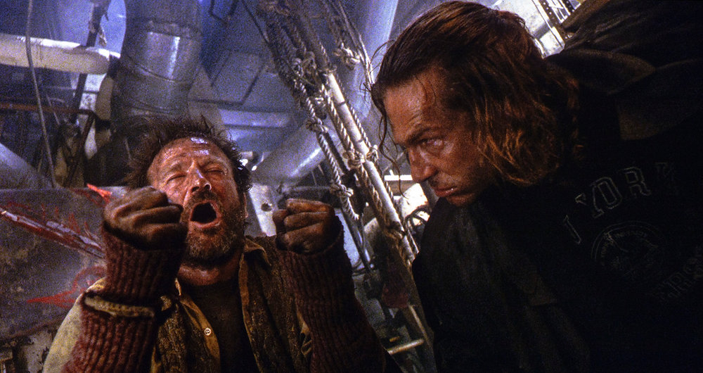 Jeff Bridges and Robin Williams, looking grungy.