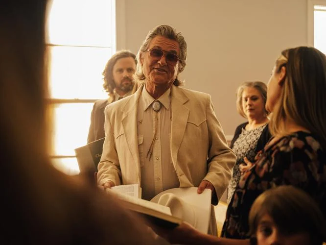 Kurt Russell, in church.